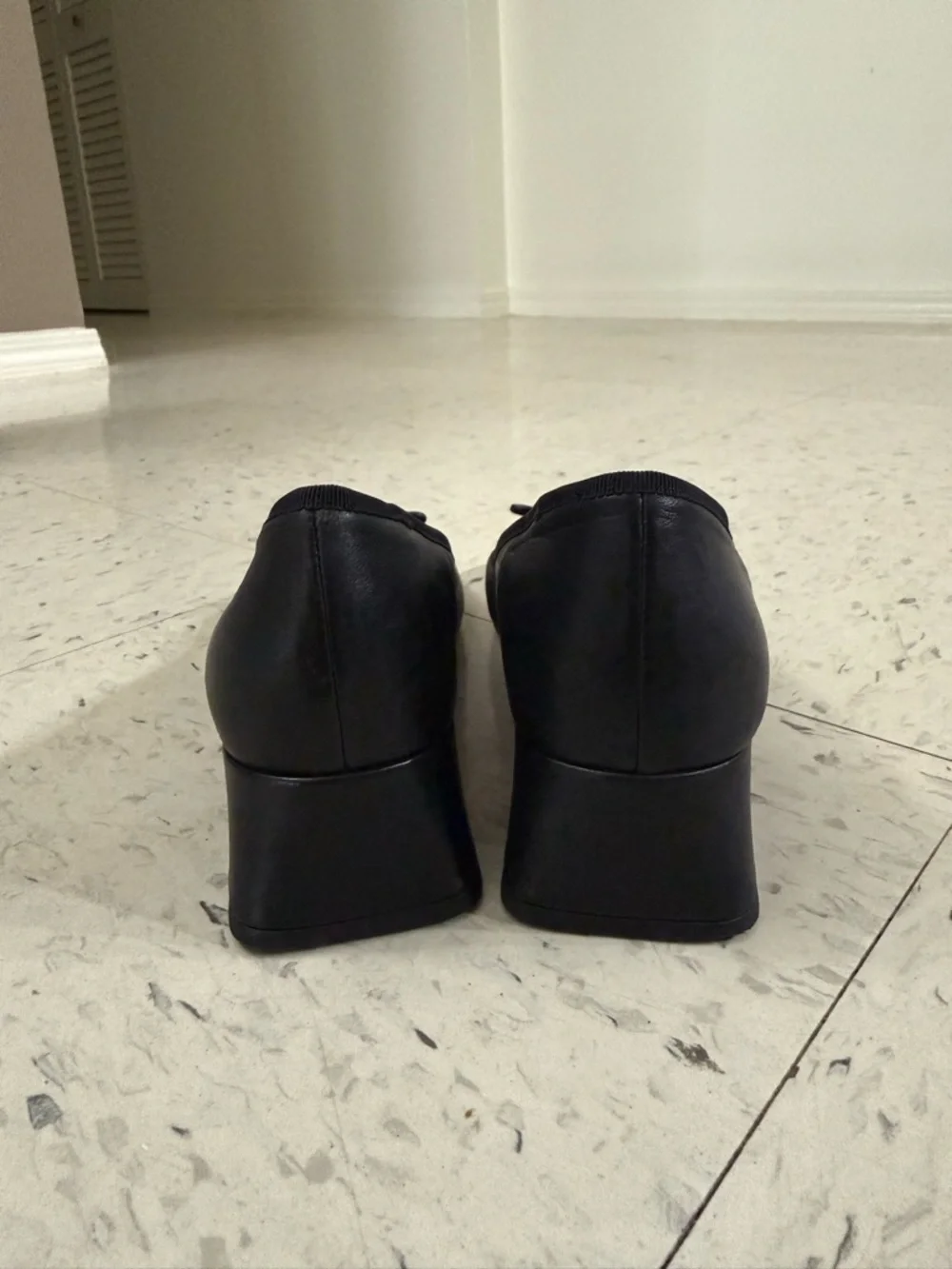 Coach Black Leather Ballet Heels with Bow and Gold 'C' Accent - Picture 4 of 9